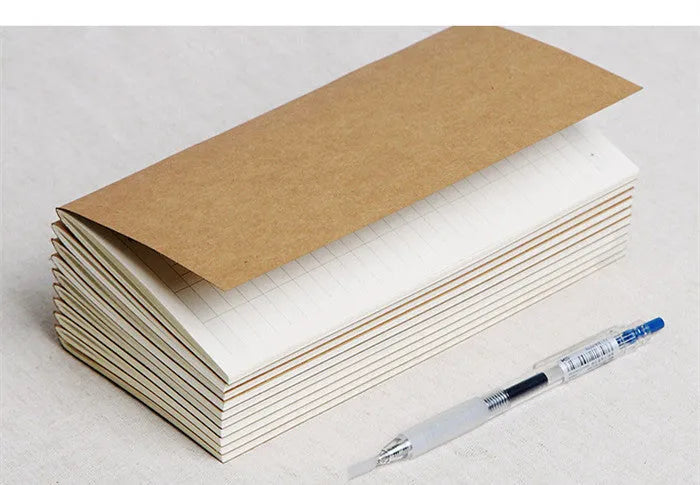 Standard size travel diary refill inner core with dots and blank ruled page options.