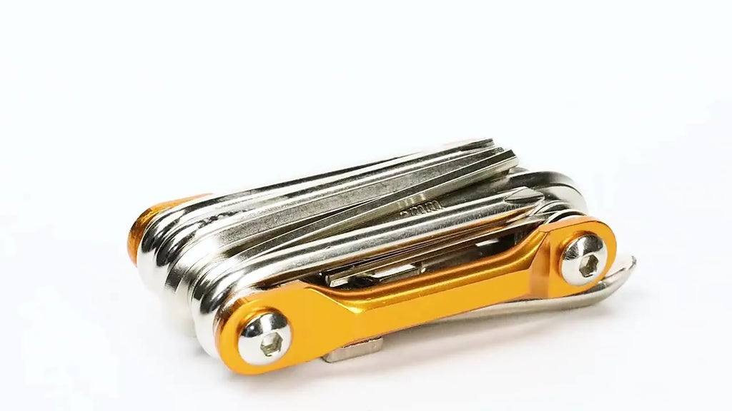 Black aluminium alloy combination bicycle repair tool set with chain breaker in a storage bag