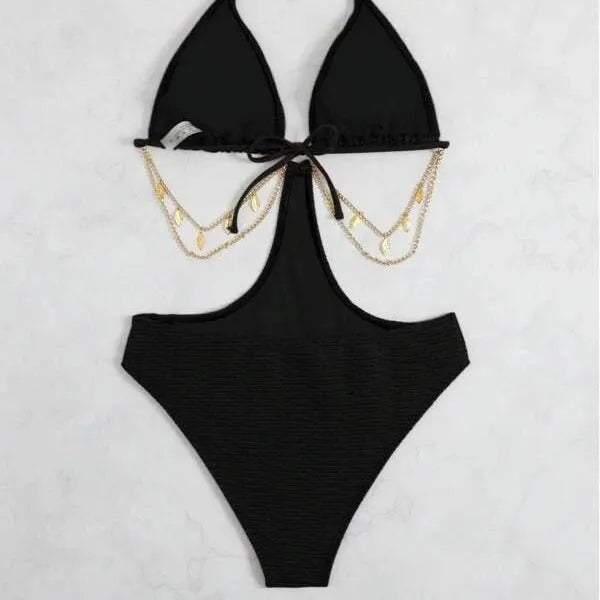 Women's black bikini swimsuit with chain detail on a mannequin.