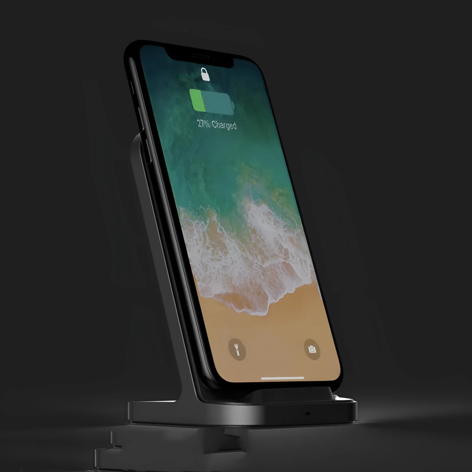 Dark grey vertical wireless charging base for Apple iPhones on desktop