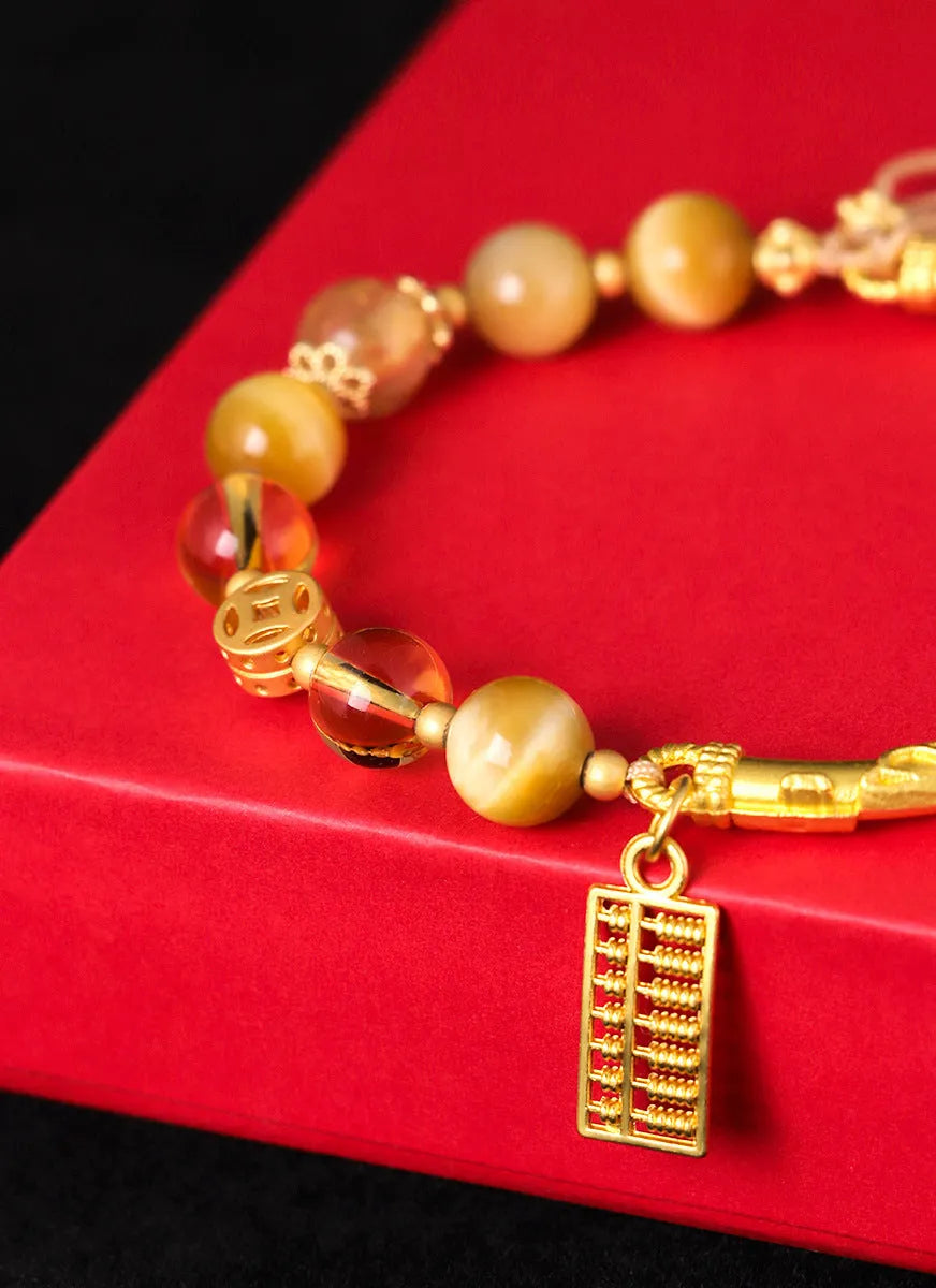 Women's abacus tag bracelet with tigereye and citrine gemstone beads and copper diamond charm