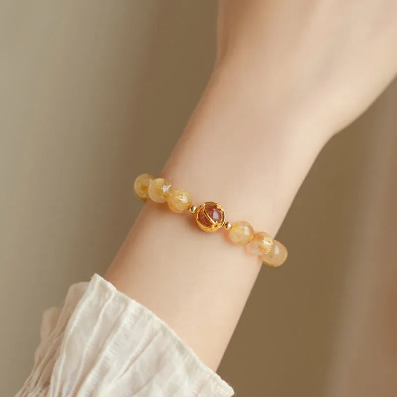 Gold rutilated quartz crystal bracelet with diamond-shaped beads in unisex Korean style