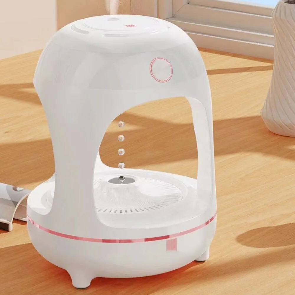 Rose gold and white ultrasonic humidifier with levitating water drop design and LED night light