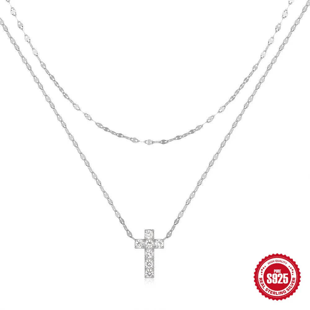 S925 sterling silver double layer twin diamond cross pendant necklace on a clavicle chain in gold colour.