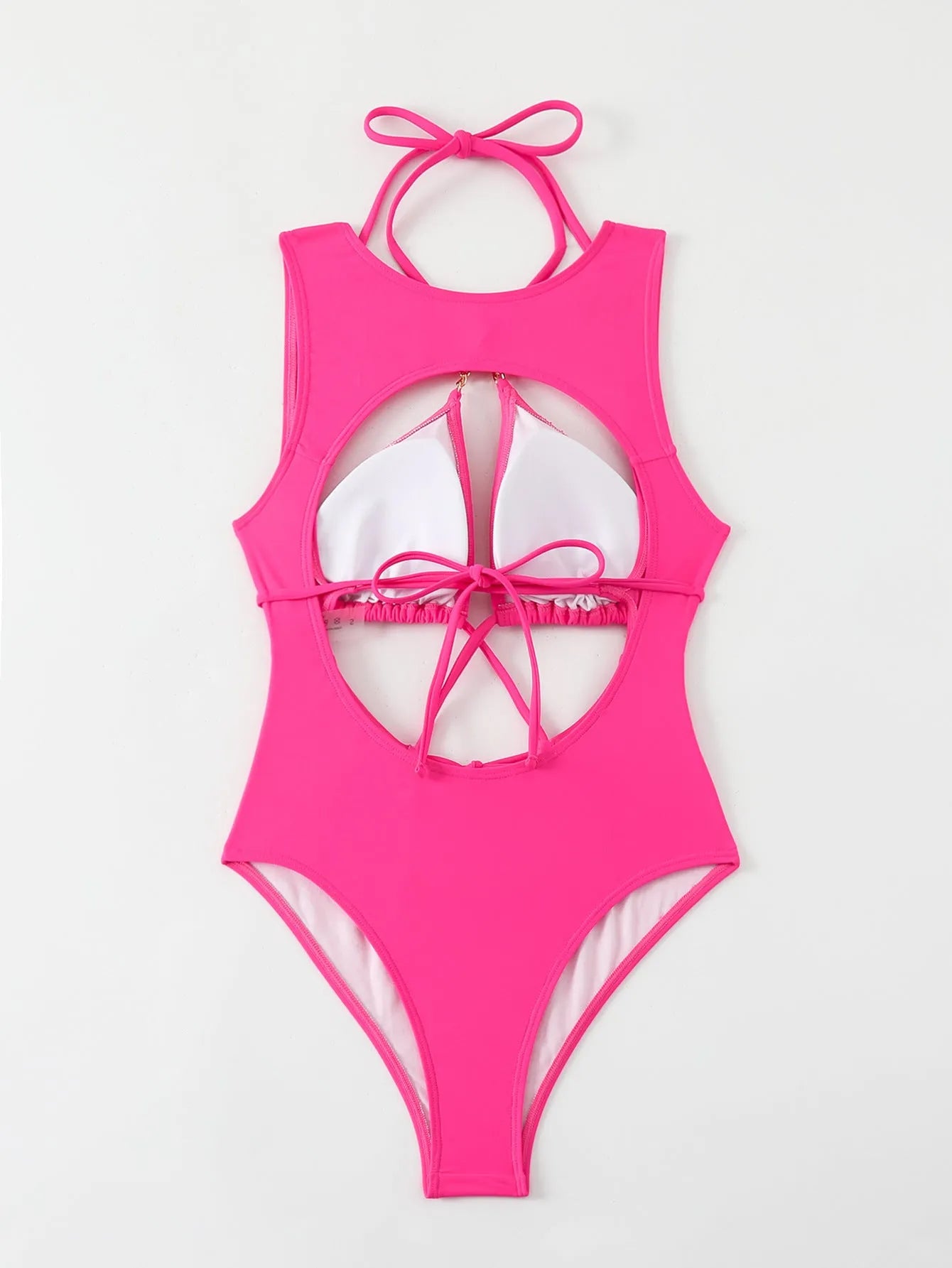 Bright pink nylon one-piece swimsuit with sexy cutout strap design for adult women