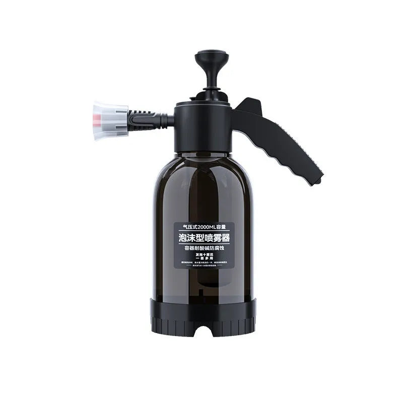 Black hand-held foam sprayer with a 2-litre capacity bottle and pump mechanism.