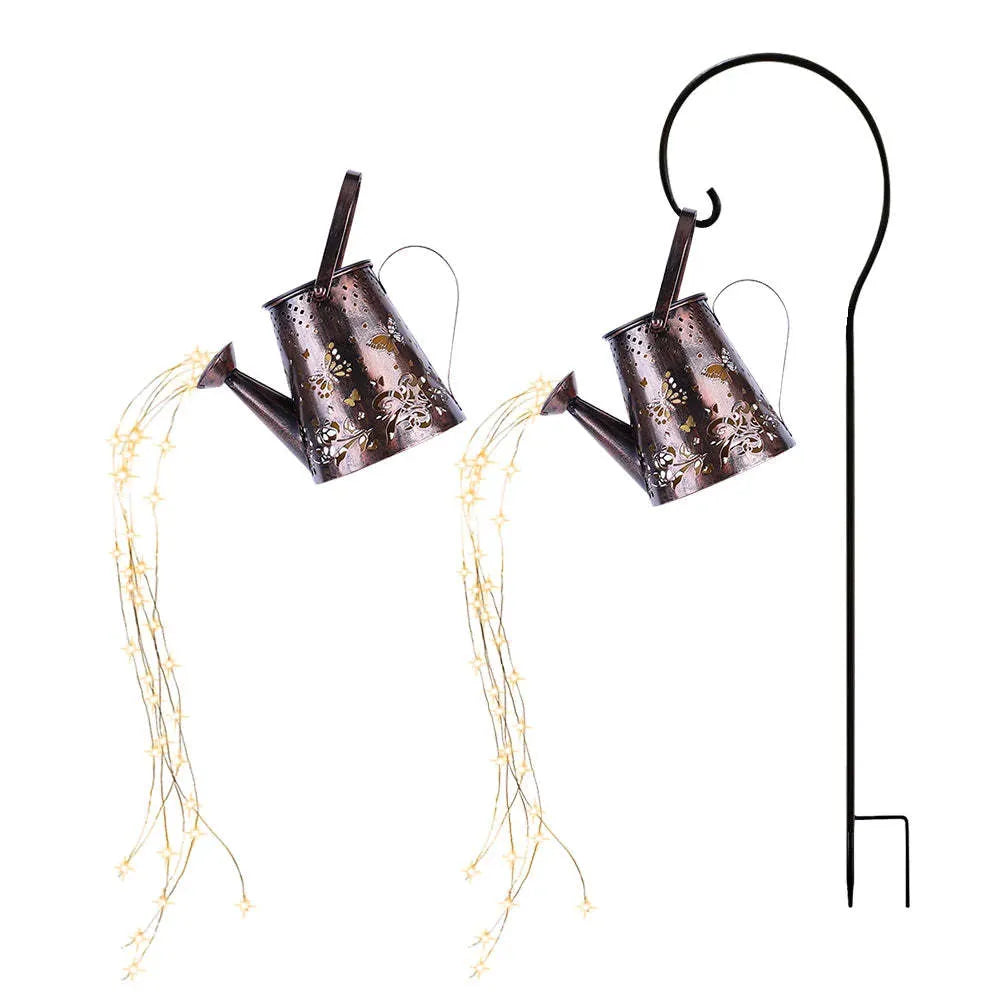 Solar garden lamp with iron tapered butterfly design emitting warm white LED light