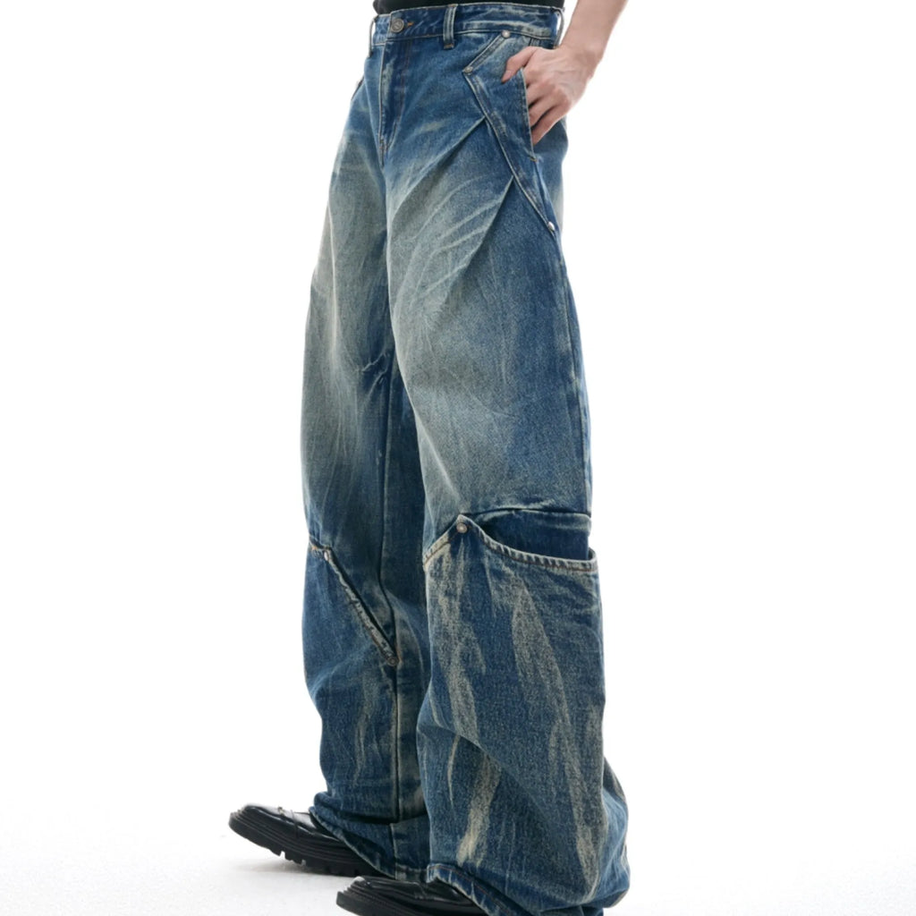 Men's retro washed burst pattern jeans with curved knife detailing in verdant blue colour