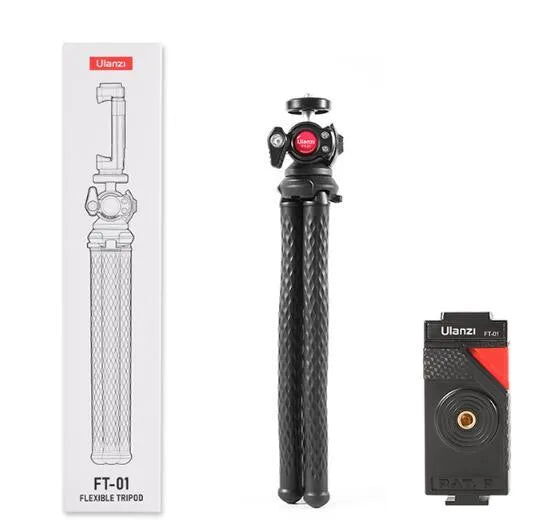 Black octopus-style mobile phone tripod with clip extended to 360mm on a table.