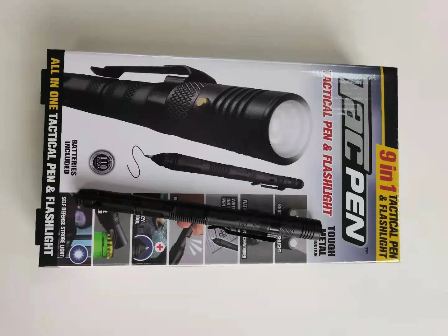 Nine-in-one multi-function flashlight survival pen in black with dual light sources and car window breaker