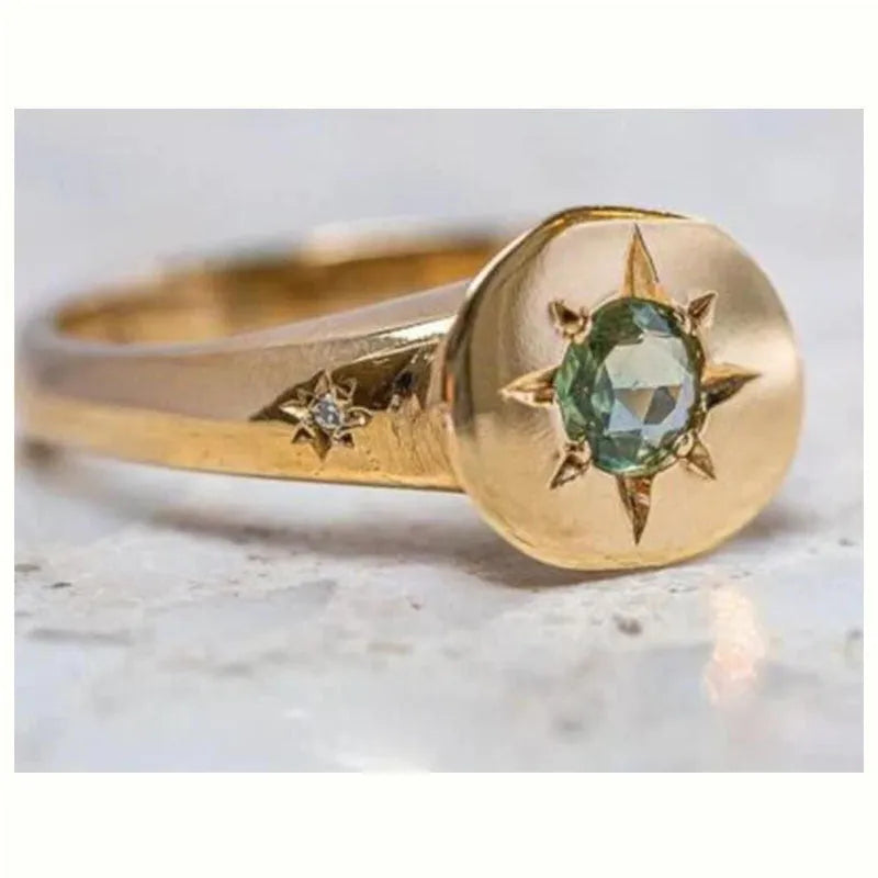 Gold colour adjustable ring with oval asterism zircon star design on zinc alloy.