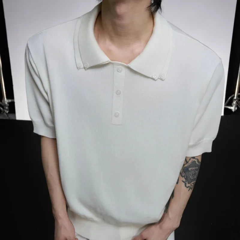 Men's black slim-fit double collar knit short sleeve shirt laid flat showing lapel detail