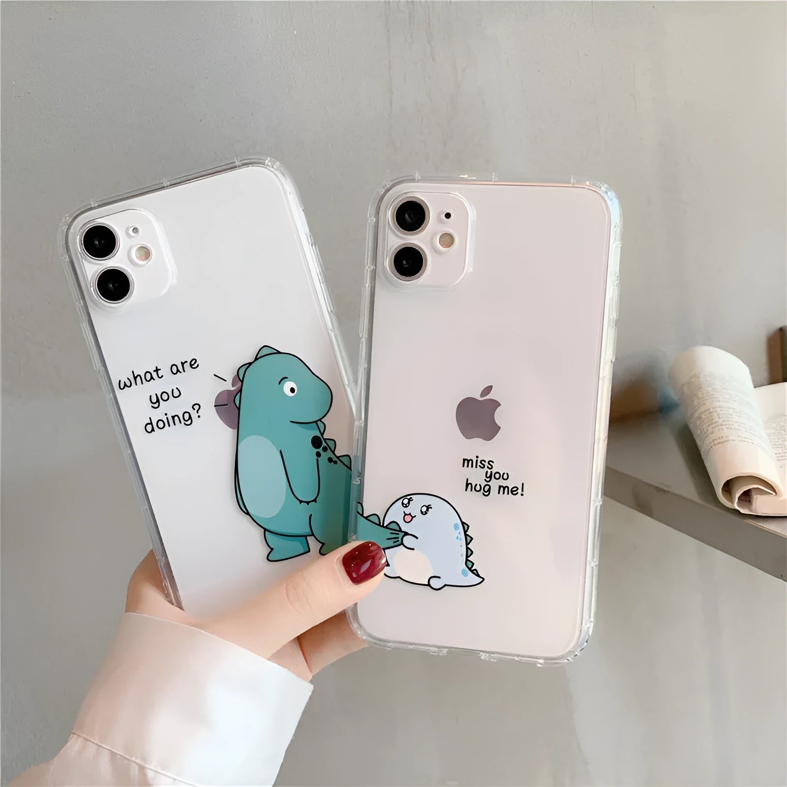Transparent iPhone case with green dinosaur design and airbag anti-fall protection