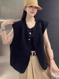 Women's loose-fit short vest in polyester, shown in milk white with side pockets.
