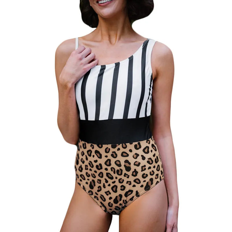 Leopard print one-piece swimsuit for women with an asymmetric collar and high-waist triangle briefs.