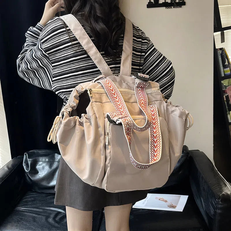 Nylon mommy bag in large capacity tote style, available in multiple colours for travel and daily use