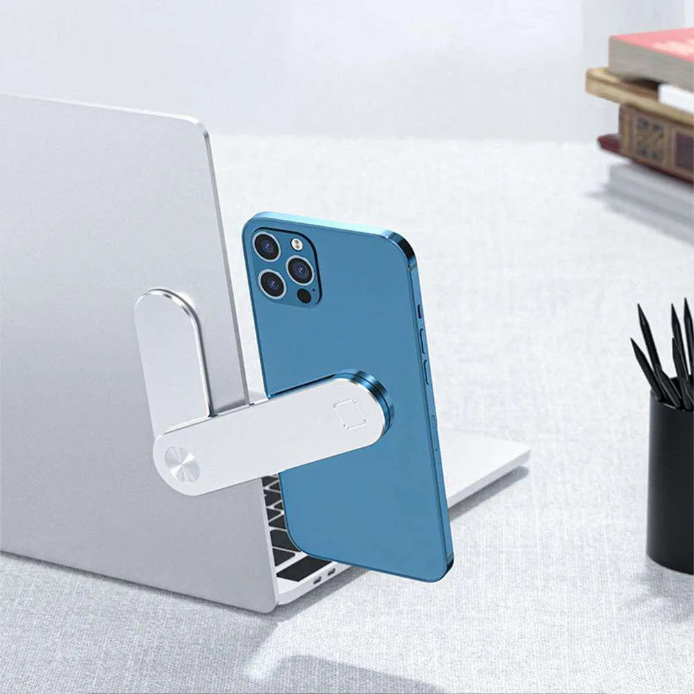 Black aluminium laptop phone holder mounted to computer monitor with smartphone attached