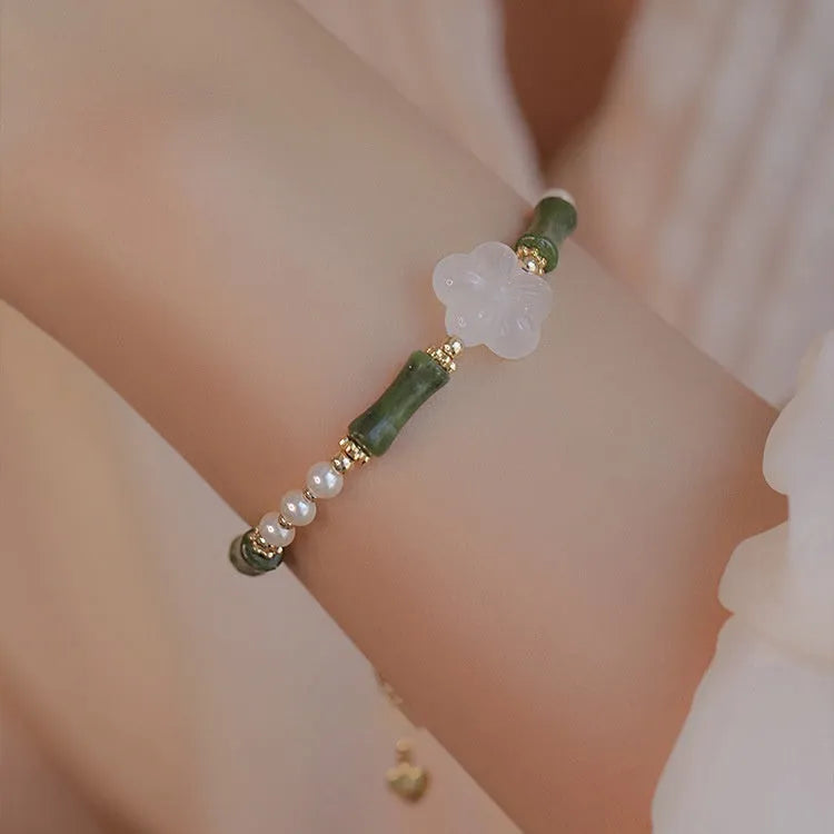 Chinese style olivine bracelet with Hetian jade and copper shell pearls featuring bamboo joint design
