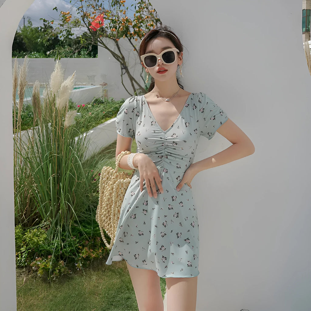 Green gathered fairy-style one-piece swimsuit with backless design and high elasticity for sports and swimming
