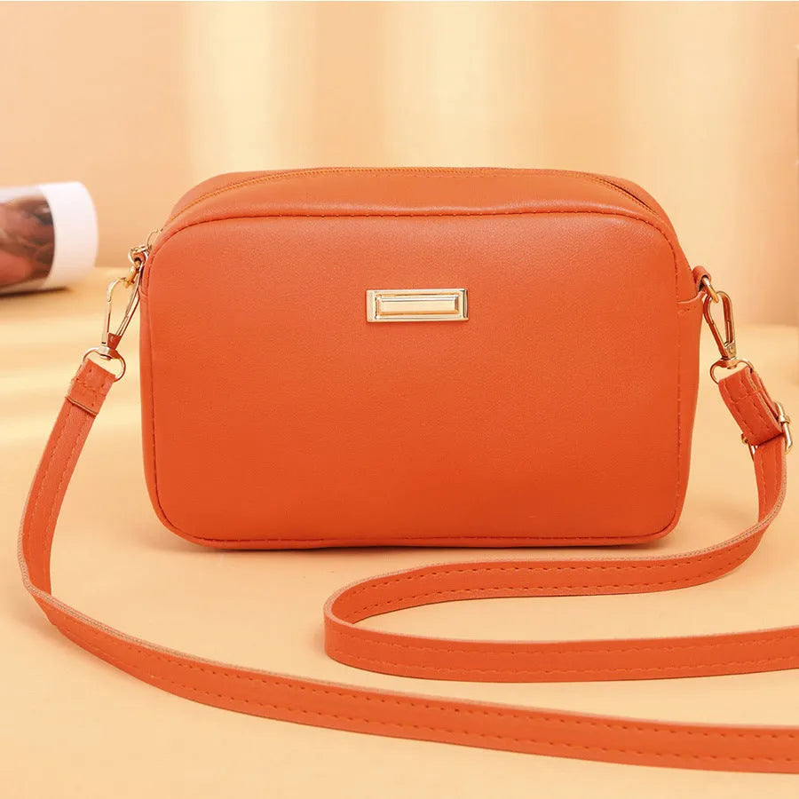 Ladies' PU shoulder bag with three-dimensional pocket in horizontal square design