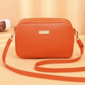 Ladies' PU shoulder bag with three-dimensional pocket in horizontal square design