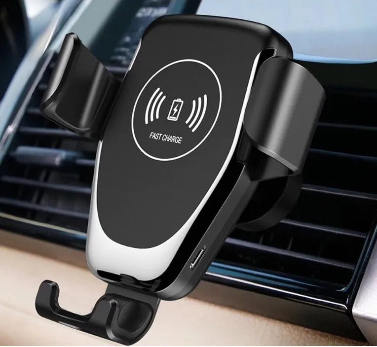 Black car wireless charger mounted on dashboard showing automatic clamp holding iPhone