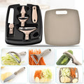 Brown eight-piece kitchen cutter set with peeler, knife and chopping board on wheat straw base