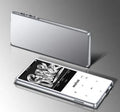 Ultra-thin portable MP3 player with 2.4-inch touchscreen, available in black, silver, blue, or red colours.