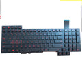 Black wired PS/2 keyboard with multimedia keys on a desk.