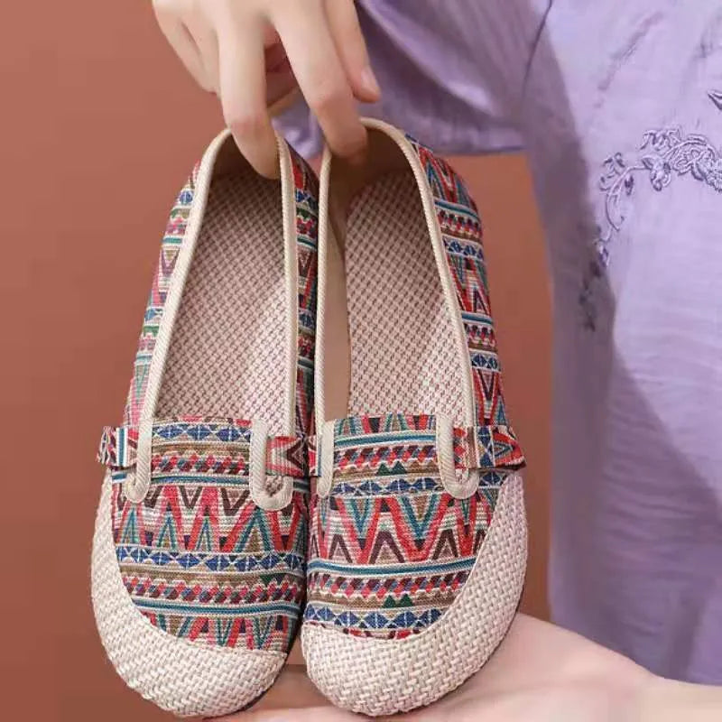 Women's ethnic style cloth shoes with colour stitching, cotton lining, and flat heel in shallow mouth design