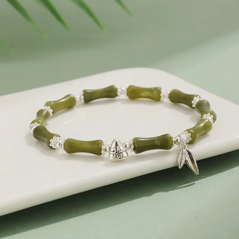 Electroplated bamboo strawberry crystal bracelet for women in green aventurine, showing natural stones on a bracelet.