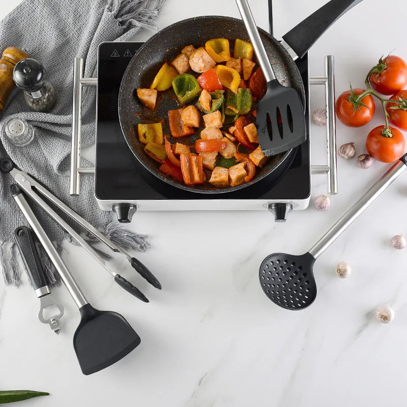 Black silicone spatula spoon set with stainless steel handles showing 16 kitchen utensils