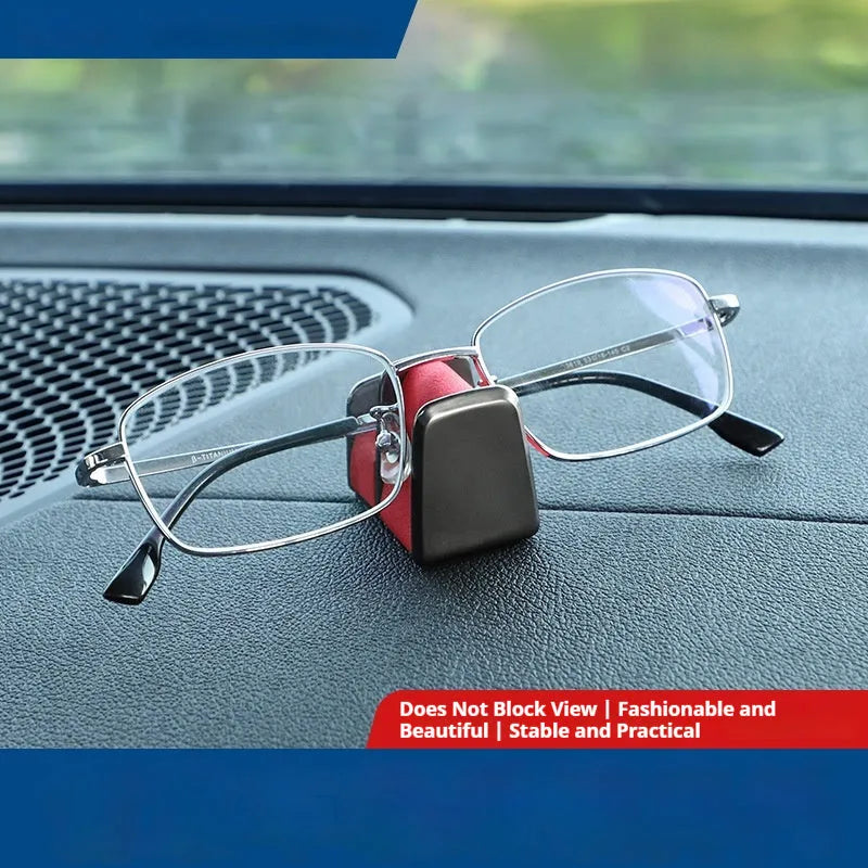 Zinc alloy and leather car dashboard glasses clip holder in green colour.
