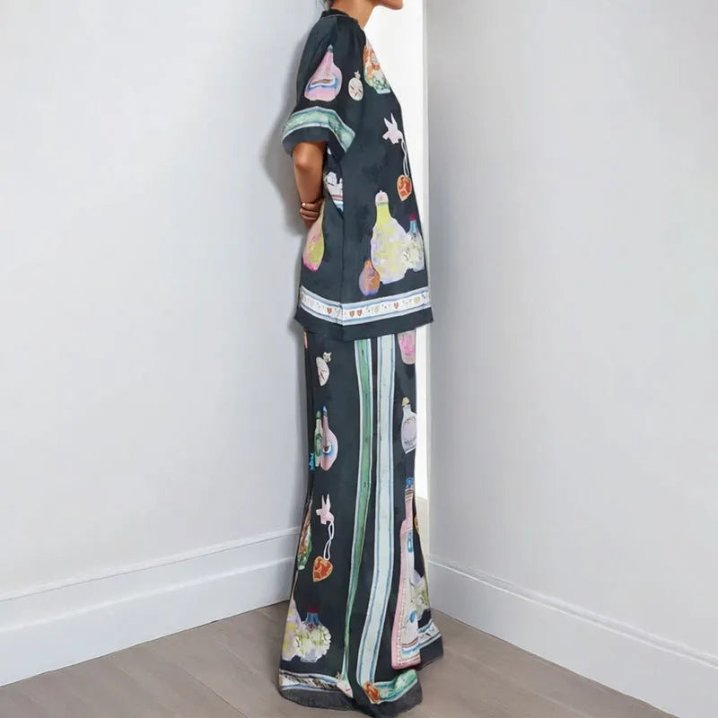 Black women's casual set with cartoon pattern featuring cardigan top and trousers