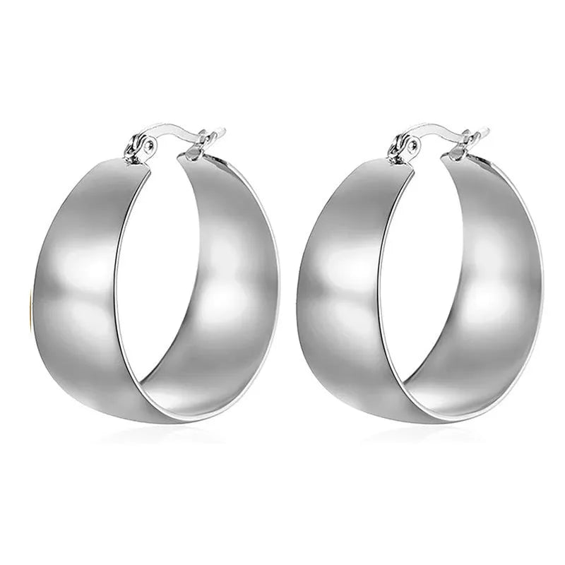 Curved widened stainless steel earrings with titanium steel in gold or steel colour, 25mm or 30mm sizes