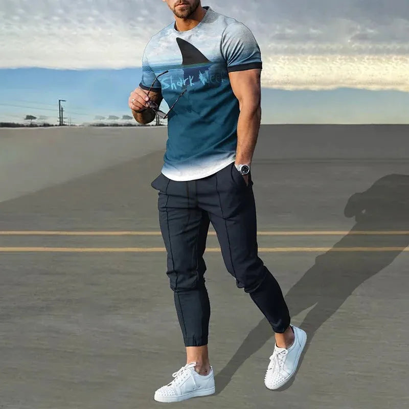 Man wearing a solid colour printed short-sleeve T-shirt and matching trousers from a sportswear set.