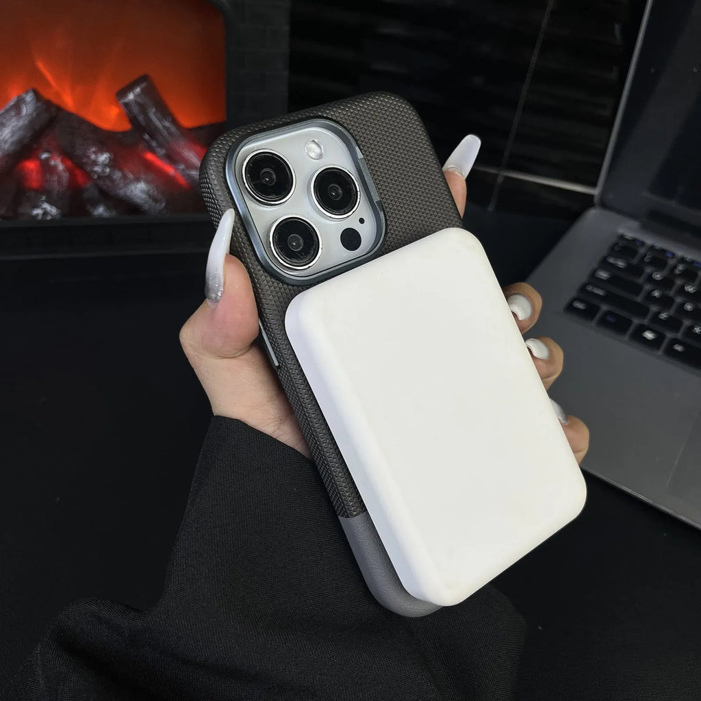 Black magnetic iPhone case with dragon scale texture and leather-like stitching, shown on an iPhone 15 Pro Max.