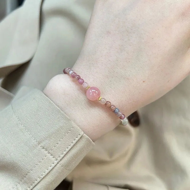 Women's geometric pink crystal bracelet with electroplated finish showing eight style variations