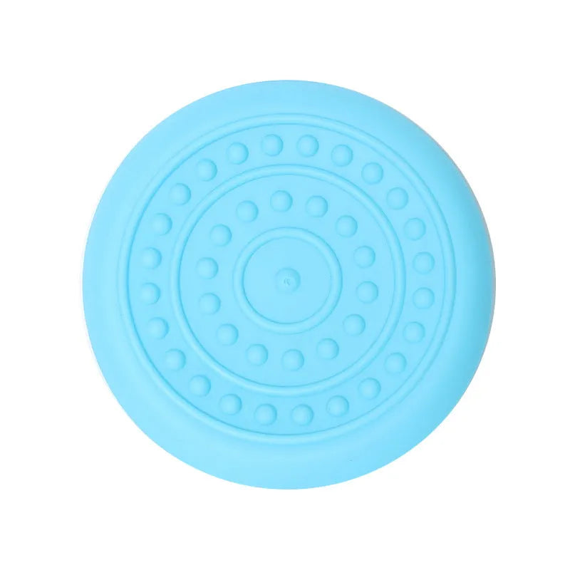 Rubber dog flying disc toy in multiple colours showing small and large size variants for canine fetch games