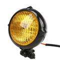 Black cast aluminium 8cm halogen motorcycle headlight for Harley-style custom builds.