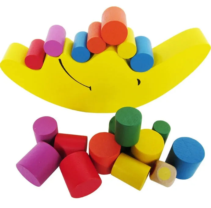 Wooden moon-shaped balance game with blue and yellow pieces for children aged 2-4 years