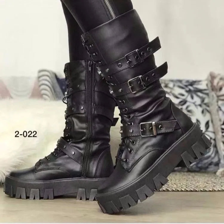 Women's black mid-calf boots with round toe, side zip, and adjustable metal buckle strap.