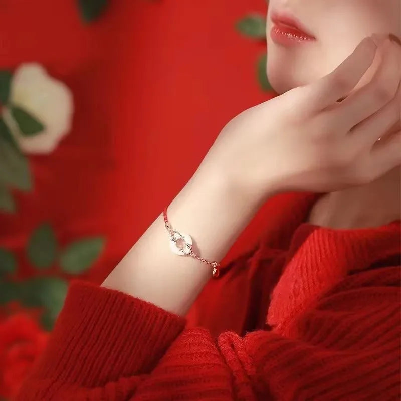 Women's festive koi design bracelet with a peace buckle and red rope, Japanese Korean style.