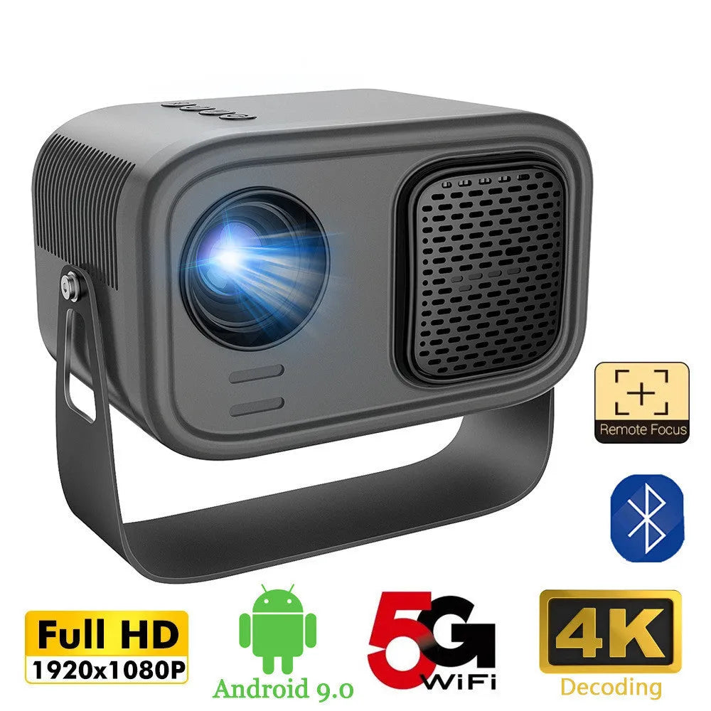 Black compact HD smart portable projector with remote control on a table.