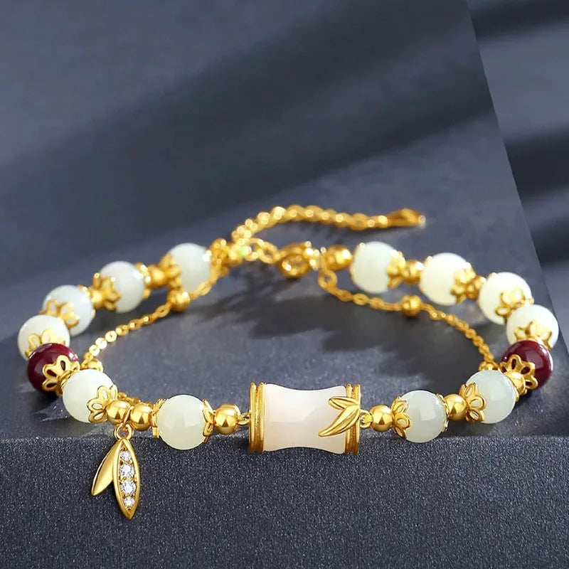 Bamboo bracelet with glass flower charm and Ruyi pattern in beige, green, light green, or white