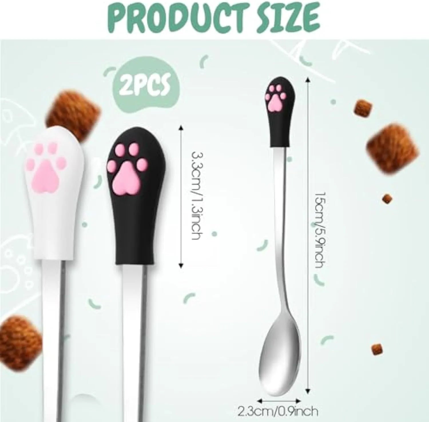 White and black stainless steel pet food spoons with cat paw print and silicone handle grips.