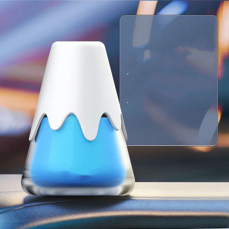 Glass car aromatherapy diffuser with fragrance cream measuring 9.1 by 6.9 cm