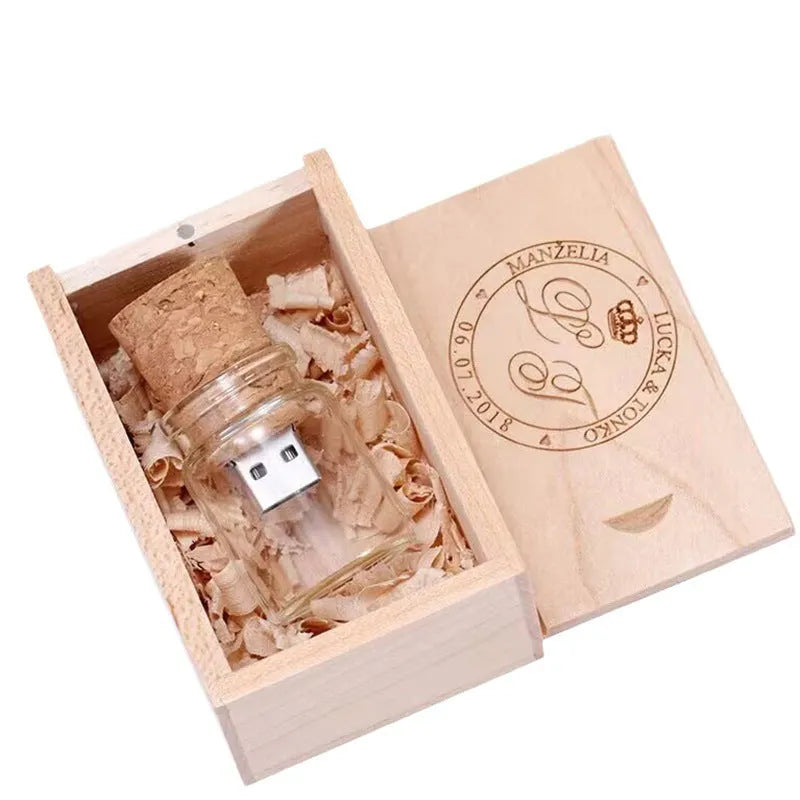 Transparent wooden wish drift bottle containing a USB flash drive on a white background.