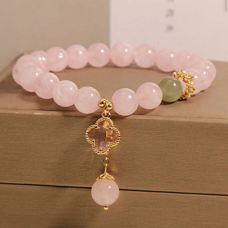Pink crystal women's bracelet with four-leaf clover pendant and alloy gemstone inlay