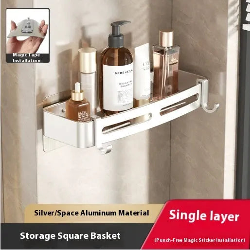 Gun grey metal fan-shaped corner bathroom shelf mounted punch-free on a wall, holding bathroom toiletries.